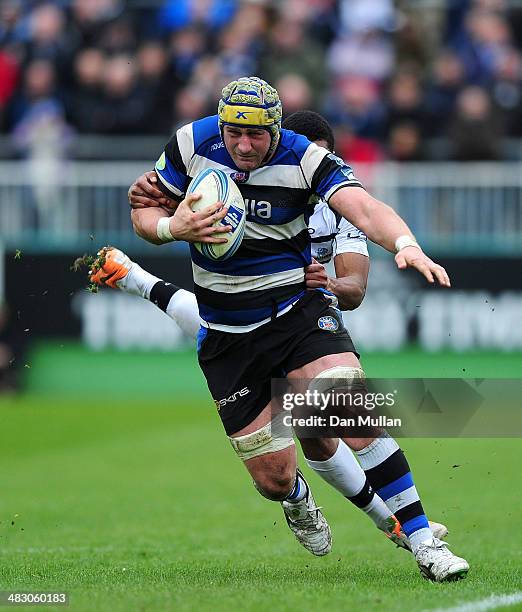 Carl Fearns of Bath is tackled by Venione Voretamaya of Brive during the Amlin Challenge Cup quarter final match between Bath and Brive at the...