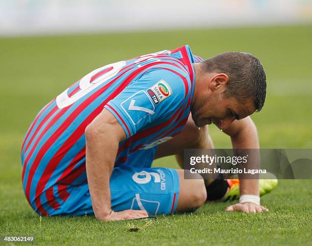 Gonzalo Bergressio of Catania appears dejected after the Serie A match between Calcio Catania and Torino FC at Stadio Angelo Massimino on April 6,...