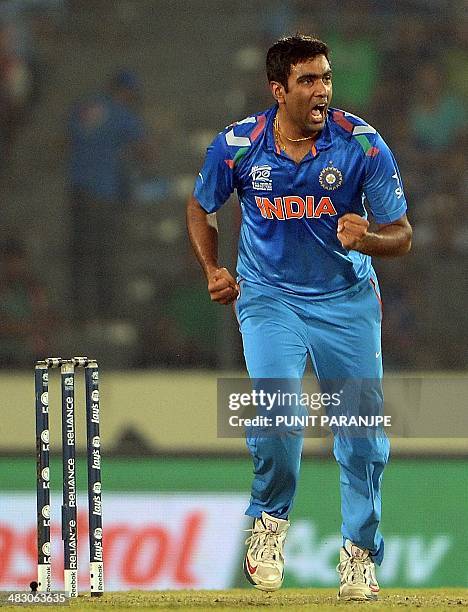 India bowler Ravichandran Ashwin celebrates after taking the wicket of Sri Lanka batsman Tillakaratne Dilshan during the ICC World Twenty20 cricket...