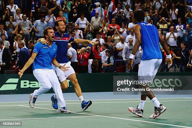 Gael Monfils of France celebrates with team mates after winning his match against Peter Gojowczyk of Germany during day 3 of the Davis Cup Quarter...