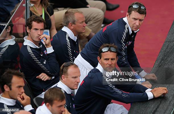 Andy Murray and the team bench of Great Britain shows their frustration as they watch team mate James Ward during the fifth and decisive rubber...