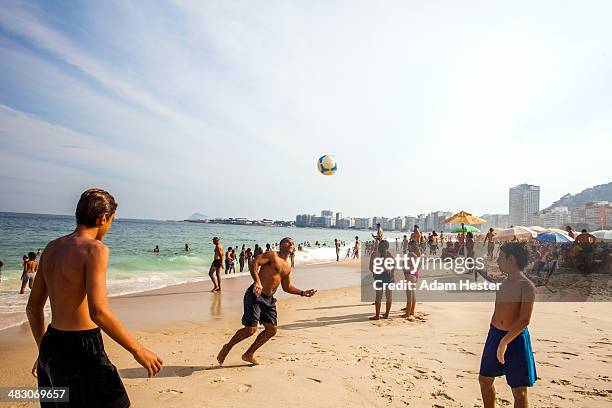 people playing games and having fun on copacabana. - copacabana beach stock pictures, royalty-free photos & images
