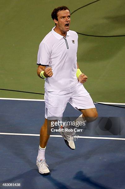Teymuraz Gabashvili of Russia celebrates after defeating Andy Murray of Great Britain in three sets during their singles match at Rock Creek Tennis...