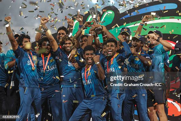 The Sri Lankan team are presented with the trophy following their victory in the India v Sri Lanka ICC World Twenty20 Bangladesh 2014 Final at...