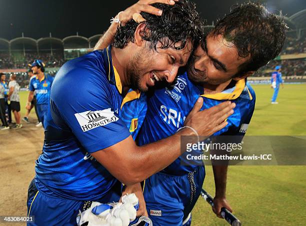 Kumar Sangakkara and Mahela Jayawardena of Sri Lanka celebrate their teams win over India after the ICC World Twenty20 Bangladesh 2014 Final between...