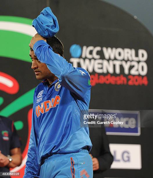 Mahendra Singh Dhoni of India reacts after losing the ICC World Twenty20 Bangladesh 2014 Final between India and Sri Lanka at Sher-e-Bangla Mirpur...