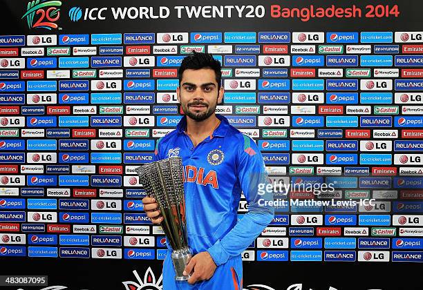 Virat Kohli of India pictured with the 'Player of the Match' award after the ICC World Twenty20 Bangladesh 2014 Final between India and Sri Lanka at...