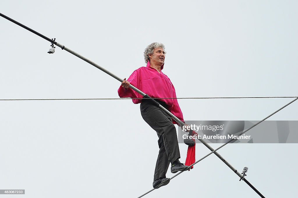 Tightrope Walker Denis Josselin Attempts To Cross The Seine