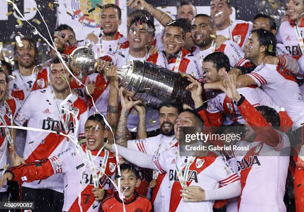 Players of River Plate celebrate with the trophy after winning a final match between River Plate and Tigres UANL as part of Copa Bridgestone...