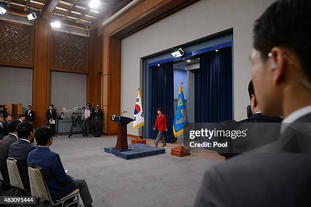 South Korea's President Park Geun-Hye arrives to deliver a live television broadcast at the presidential Blue House on August 6, 2015 in Seoul, South...