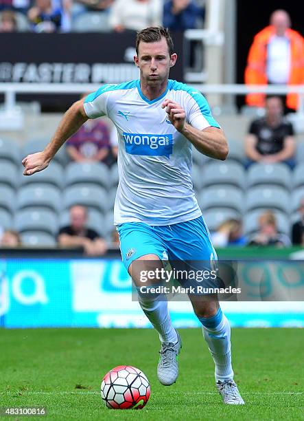 Mike Williamson of Newcastle in action during the Pre Season Friendly between Newcastle United and Borussia Moenchengladbach at St James' Park on...