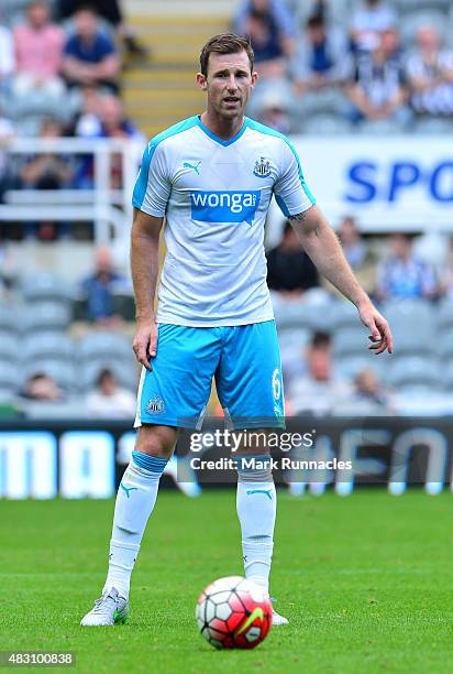 Mike Williamson of Newcastle in action during the Pre Season Friendly between Newcastle United and Borussia Moenchengladbach at St James' Park on...