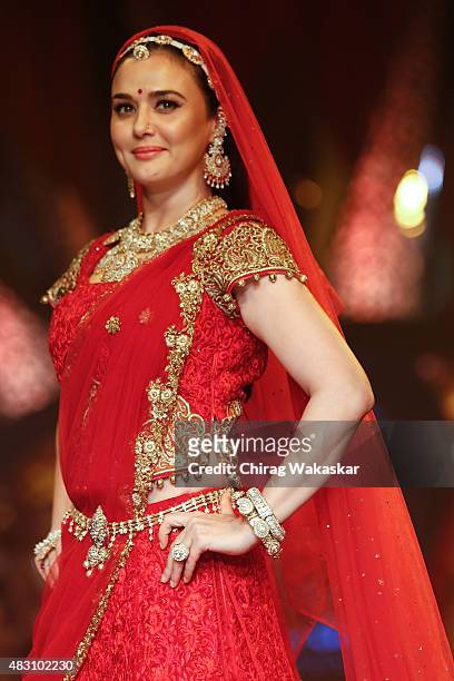 Preity Zinta walks the runway at the Birdhichand Ghanshyamdas Jewellers show during Day 4 of the India International Jewellery Week at the Grand...
