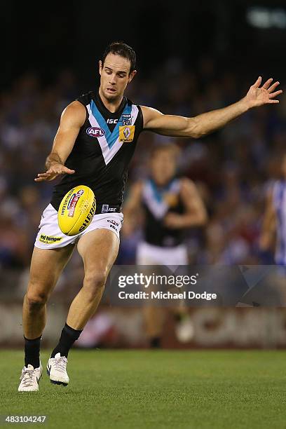 Matthew Broadbent of the Power kicks the ball during the round three AFL match between the North Melbourne Kangaroos and the Port Adelaide Power at...