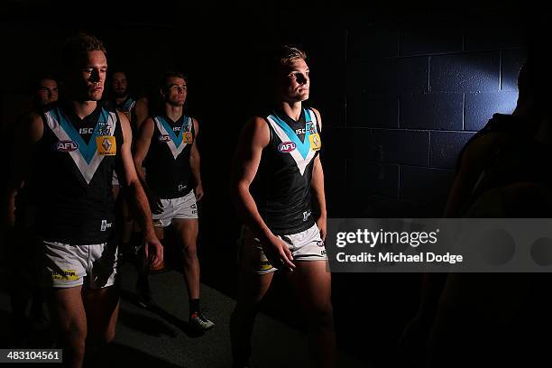 Ollie Wines of the Power walks out to the ground during the round three AFL match between the North Melbourne Kangaroos and the Port Adelaide Power...