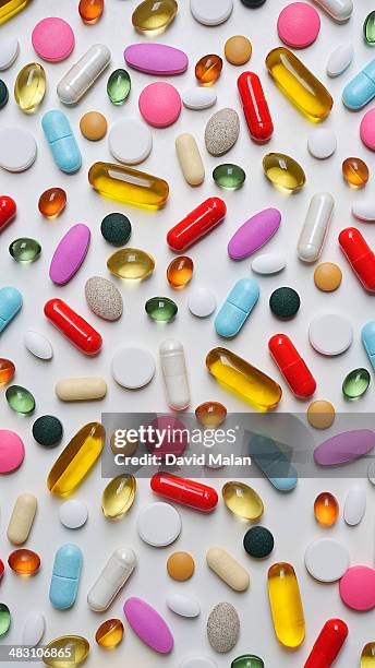 top view of various pills and tablets - pills colorful stock pictures, royalty-free photos & images