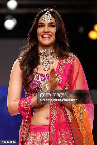 Kriti Sanon walks the runway at the Sunil Jewellers show during Day 4 of the India International Jewellery Week at the Grand Hyatt on August 6, 2015...