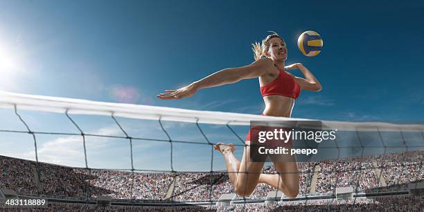 volleyball girl about to score - beach volleyball stockfoto's en -beelden