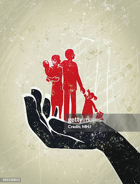 eltern und kinder auf einer riesigen schützende hand - protecting children stock-grafiken, -clipart, -cartoons und -symbole