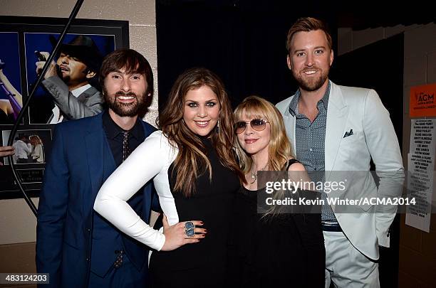 Singer Stevie Nicks poses with musicians Dave Haywood, Hillary Scott and Charles Kelley of Lady Antebellum at the 49th Annual Academy of Country...