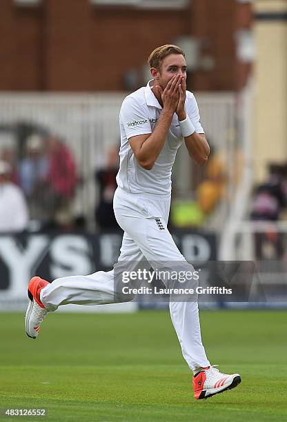 Stuart Broad of England looks on in disbelief at Ben Stokes after his amazing catch to dismiss Adam Voges of Australia during day one of the 4th...