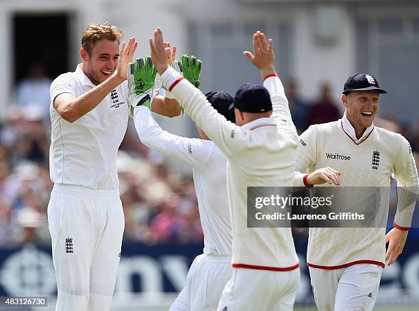 Stuart Broad of England celebrates the wicket of Mitchell Johnson of Australia during day one of the 4th Investec Ashes Test match between England...