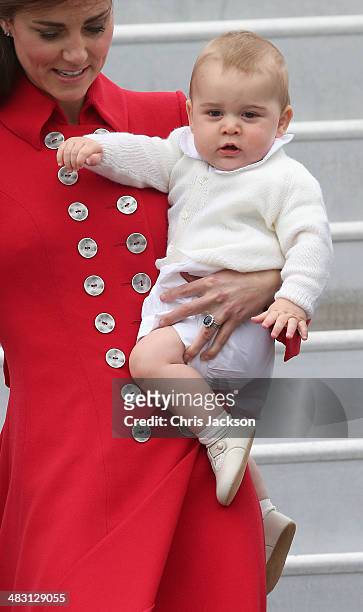 Catherine, Duchess of Cambridge and Prince George of Cambridge arrive at Wellington Military Terminal on an RNZAF 757 from Sydney on April 7, 2014 in...