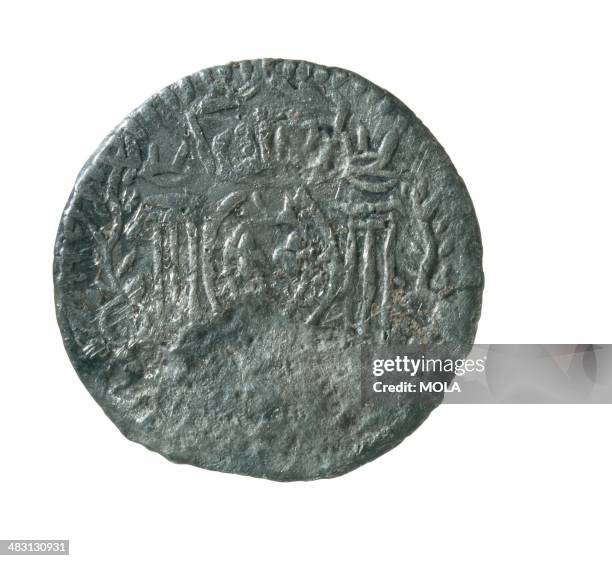 English lead token from c 1570s1590s depicting a crowned French shield set between two columns; found at the Rose playhouse and would have been used...