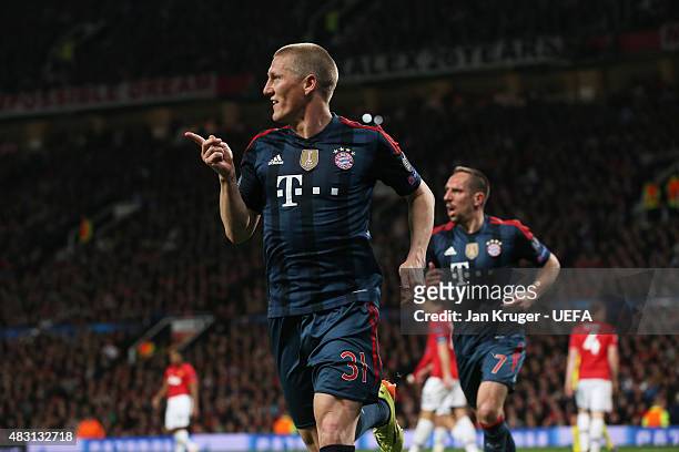 Bastian Schweinsteiger of Bayern Muenchen celebrates scoring their first goal during the UEFA Champions League Quarter Final first leg match between...