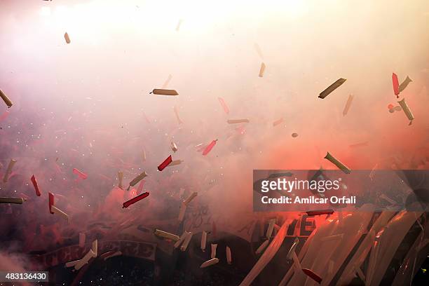 Fans of River Plate light flares to welcome the team prior to a second leg final match between River Plate and Tigres UANL as part of Copa...