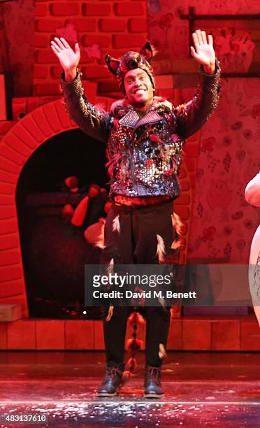 Cast member Simon Webbe bows during the curtain call at the VIP performance of "The 3 Little Pigs" at The Palace Theatre on August 6, 2015 in London,...