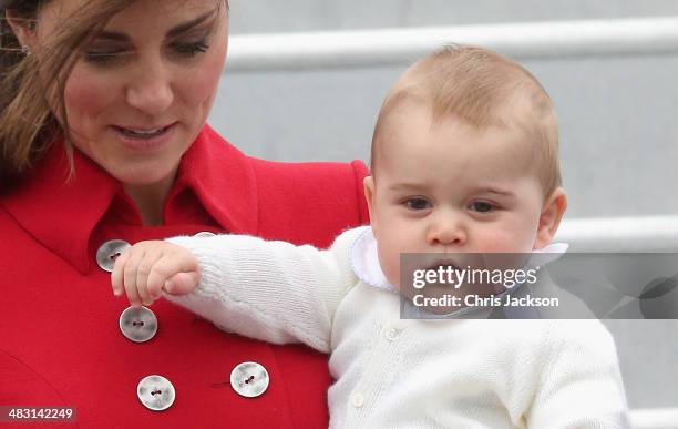 Catherine, Duchess of Cambridge and Prince George of Cambridge arrive at Wellington Military Terminal on an RNZAF 757 from Sydney on April 7, 2014 in...