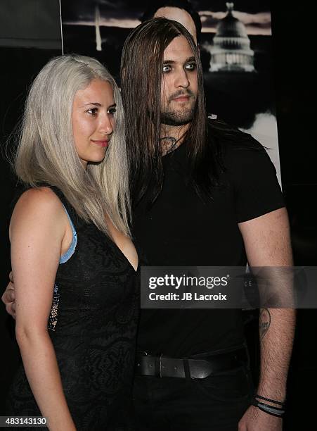 Weston Coppola Cage and Danielle Cage attend the screening of 'The Runner' held at TCL Chinese 6 theatres on August 5, 2015 in Hollywood, California.