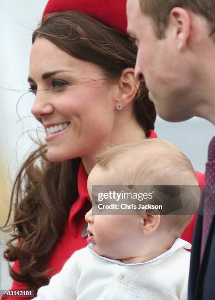 Catherine, Duchess of Cambridge, Prince William, Duke of Cambridge and Prince George of Cambridge arrive at Wellington Military Terminal on an RNZAF...