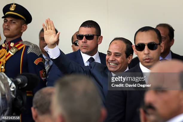 President Abdel Fattah el-Sisi walks during the opening ceremony of the new Suez Canal expansion including a new 35km channel on August 6, 2015 in...