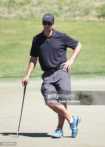 Player Aaron Rodgers waits to putt during Aria Resort & Casino's 13th Annual Michael Jordan Celebrity Invitational at Shadow Creek on April 6, 2014...