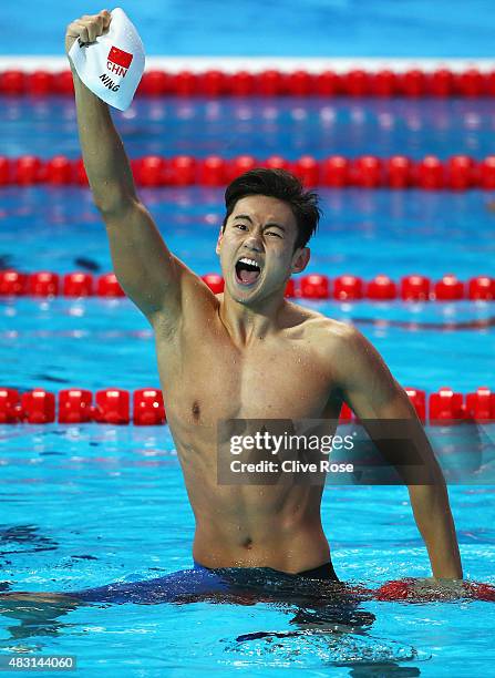 Zetao Ning of China celebrates winning the gold medal in the Men's 100m Freestyle Final on day thirteen of the 16th FINA World Championships at the...