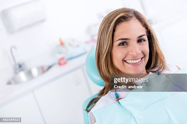 happy woman at the dentist - dental stock pictures, royalty-free photos & images