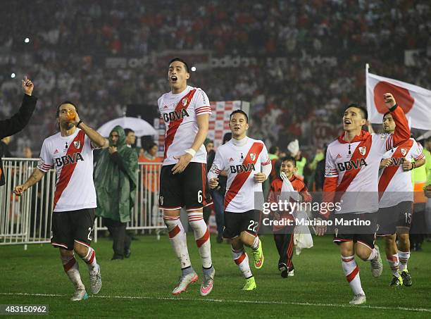 Leonardo Ponzio, Ramiro Funes Mori, Sebastian Driussi and Matias Kranevitter of River Plate celebrate after winning the second leg final match...