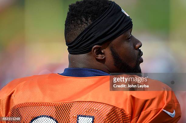 Denver Broncos defensive end Kenny Anunike heads to the field for practice on day 6 of training camp August 6, 2015 at Dove Valley.