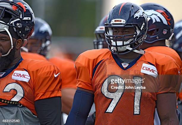 Denver Broncos defensive end Kenny Anunike gets ready for drills at practice on day 6 of training camp August 6, 2015 at Dove Valley.