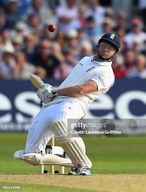 Jonny Bairstow of England avoids a bouncer from Mitchel Johnson of Australia during day one of the 4th Investec Ashes Test match between England and...