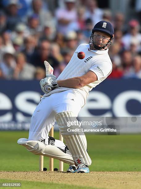 Jonny Bairstow of England avoids a bouncer from Mitchel Johnson of Australia during day one of the 4th Investec Ashes Test match between England and...