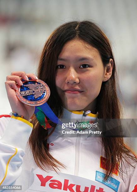 Bronze medalist Xiang Liu of China poses during the medal ceremony for the Women's 50m Backstroke on day thirteen of the 16th FINA World...