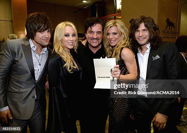 Recording artist Neil Perry, Big Machine Records Vice President Sandi Spika Borchetta, Big Machine Label Group President and CEO Scott Borchetta,...