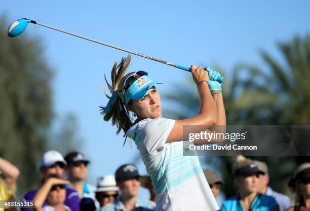 Lexi Thompson of the USA tees off on the par 4, 16th hole during the final round of the 2014 Kraft Nabisco Championship on the Dinah Shore Tournament...
