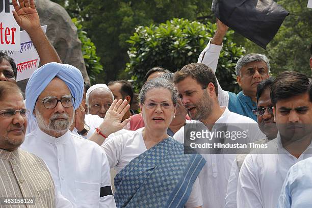 Congress President Sonia Gandhi, Vice President Rahul Gandhi with JD party leader Sharad Yadav, RJD and Samajwadi party MPs during a protest against...