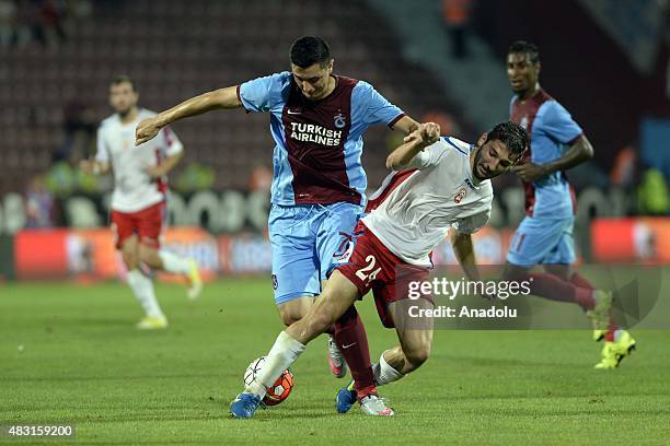 Oscar Cardozo of Trabzonspor in action against Dusko Trajcevski of Rabotnicki during the UEFA Europa League 3rd qualifying round second leg match...