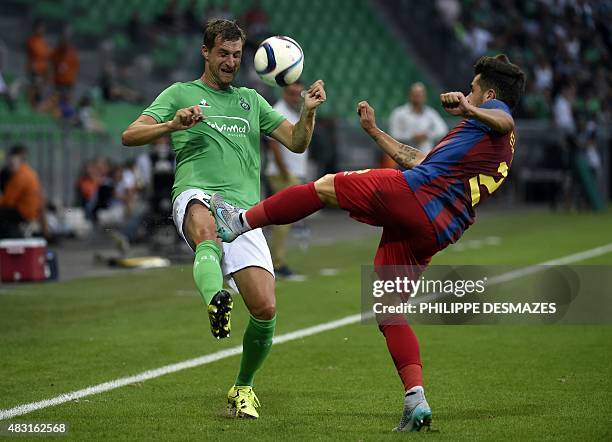 Saint-Etienne's French defender Francois Clerc vies with Targu Mures' Spanish defender Javier Velayos during the UEFA Europa League third qualifying...