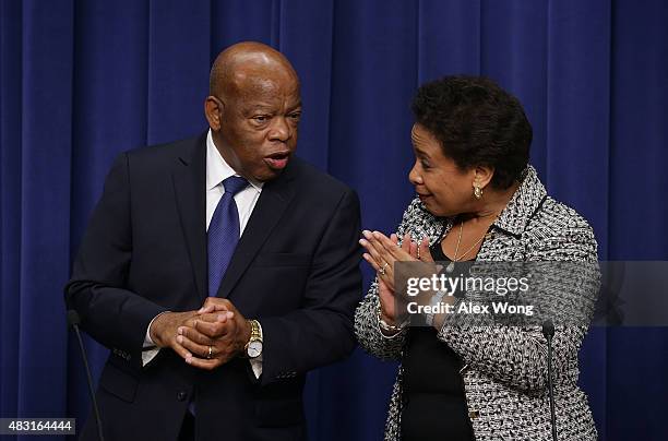 Rep. John Lewis and Attorney General Loretta Lynch attend an event at the South Court Auditorium of the Eisenhower Executive Office Building August...